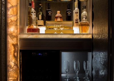 Bespoke Bar with illuminated Onyx and Hand Stitched